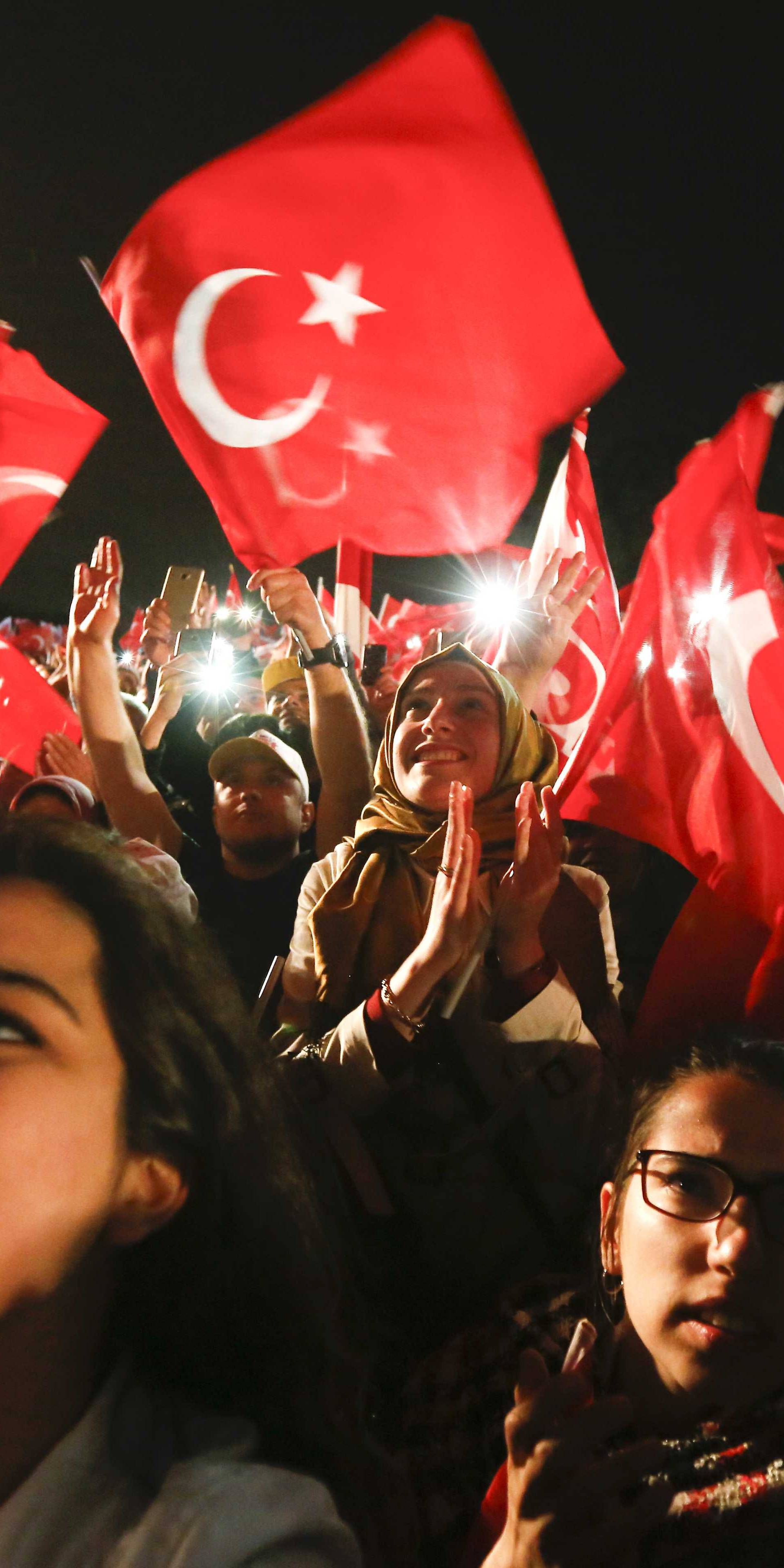 Supporters of Turkish President Tayyip Erdogan celebrate in Istanbul