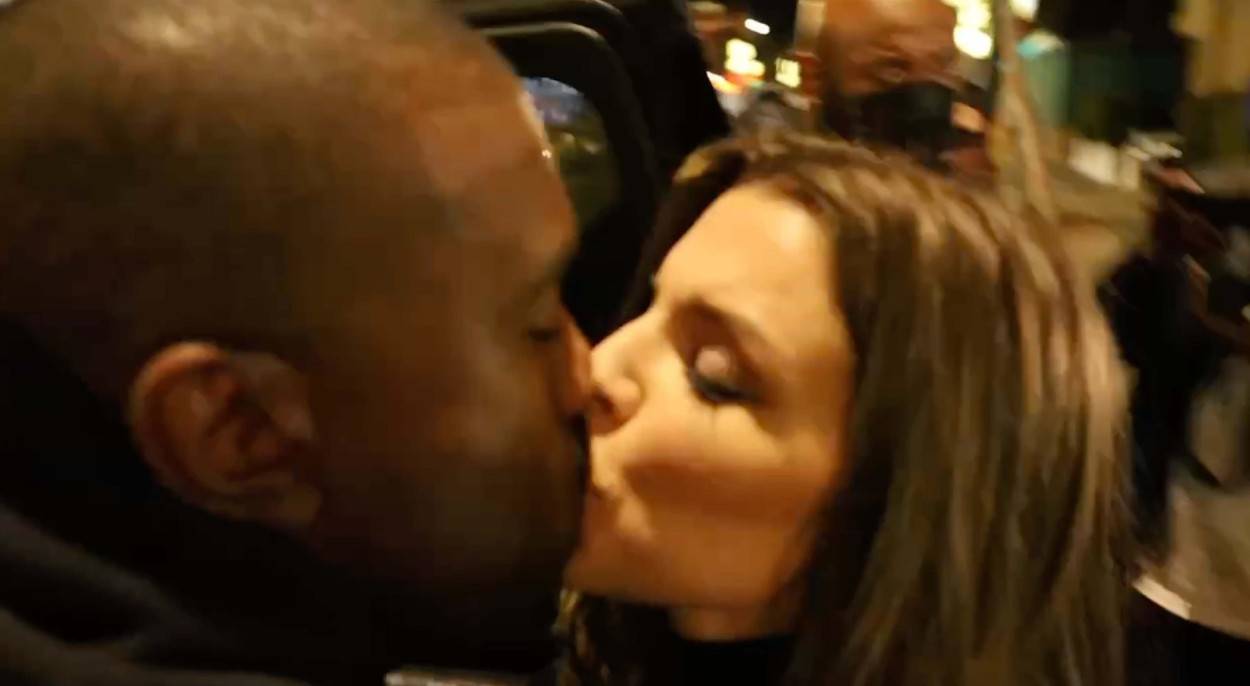 Kanye & Julia Fox share a tender kiss after dinner and she reveals intricate back tattoo