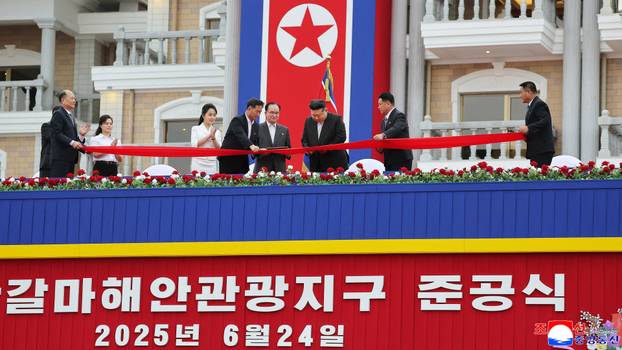 North Korean leader Kim Jong Un and his daughter Kim Ju Ae attend a ceremony to celebrate the completion of the Wonsan Kalma Coastal Tourist Zone
