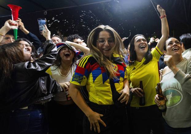Colombia fans react as they watch the 2026 FIFA World Cup match between Uzbekistan and Colombia in Mexico City
