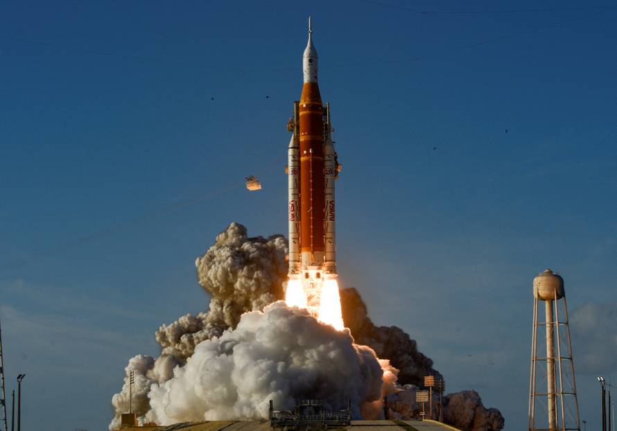 NASA's Artemis II mission to fly by the moon, comprising of the Space Launch System (SLS) rocket with the Orion crew capsule, lifts off