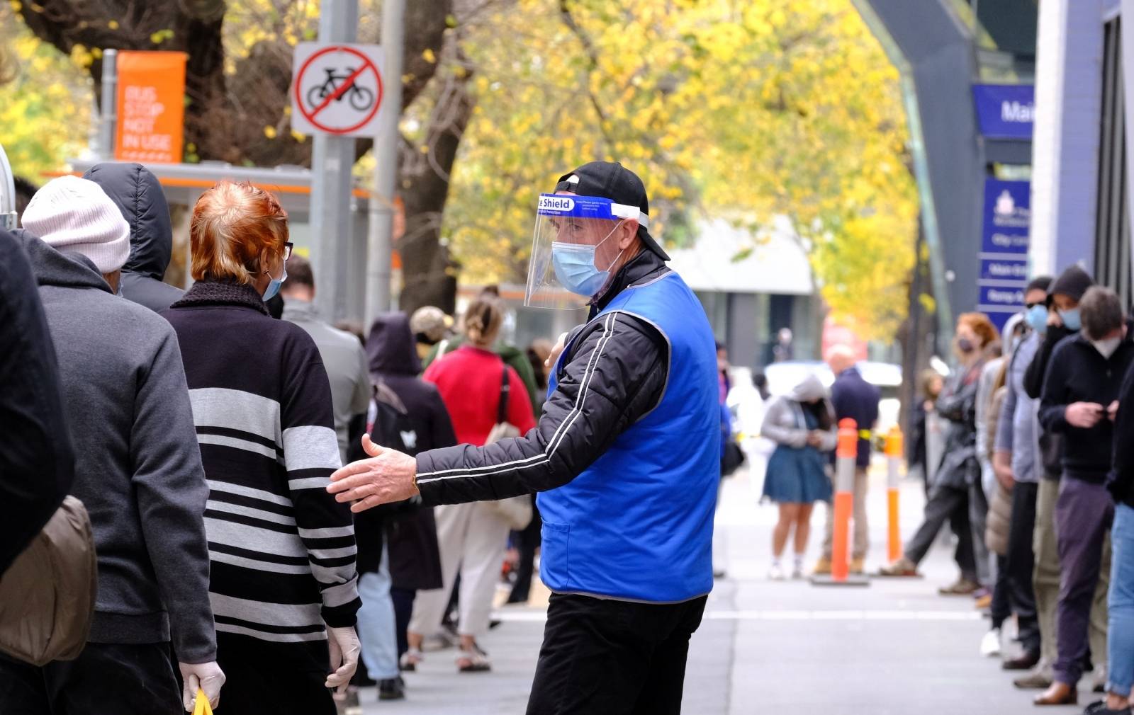 People line up to get tested for the coronavirus disease in Melbourne