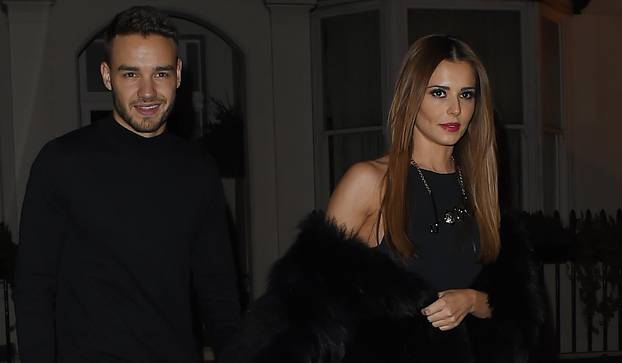 Cheryl Fernandez- Versini and Liam Payne hold hands on date night.