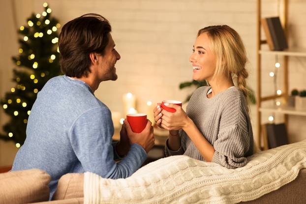 Christmas,Eve.,Cute,Couple,In,Love,Drinking,Hot,Tea,And