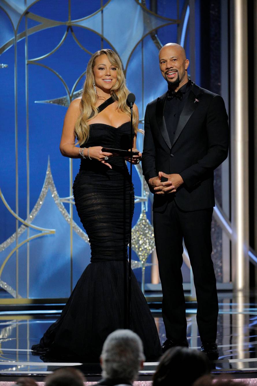 Presenters Mariah Carey and Common at the 75th Golden Globe Awards in Beverly Hills, California