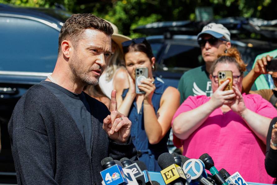Singer Justin Timberlake addresses the media after his appearance in court in Sag Harbor, New York