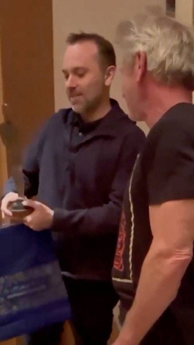 Oleksandr Pertsovskyi, CEO of Ukrainian Railways, gives an award to actor Sean Penn, in this screen grab obtained from a social media video