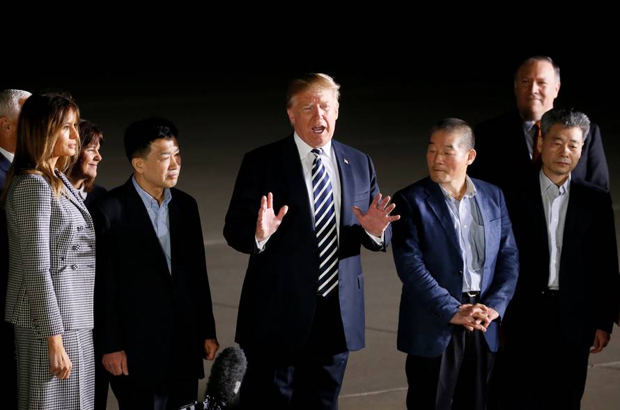 U.S.President Donald Trump speaks to the media as he meets the three Americans released from detention in North Korea upon their arrival at Joint Base Andrews