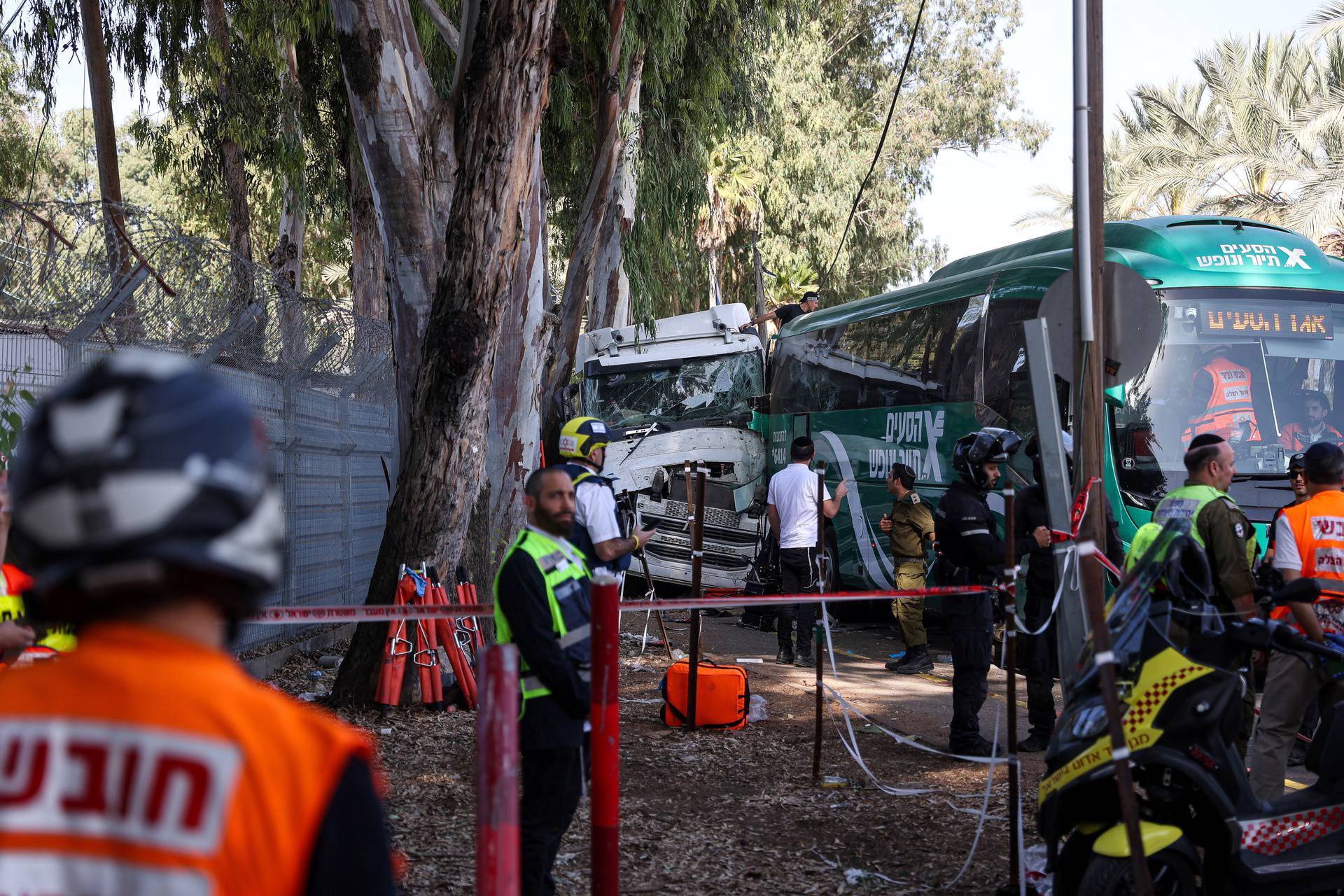 Scene where a truck rammed into pedestrians at a bus stop, in Ramat Hasharon