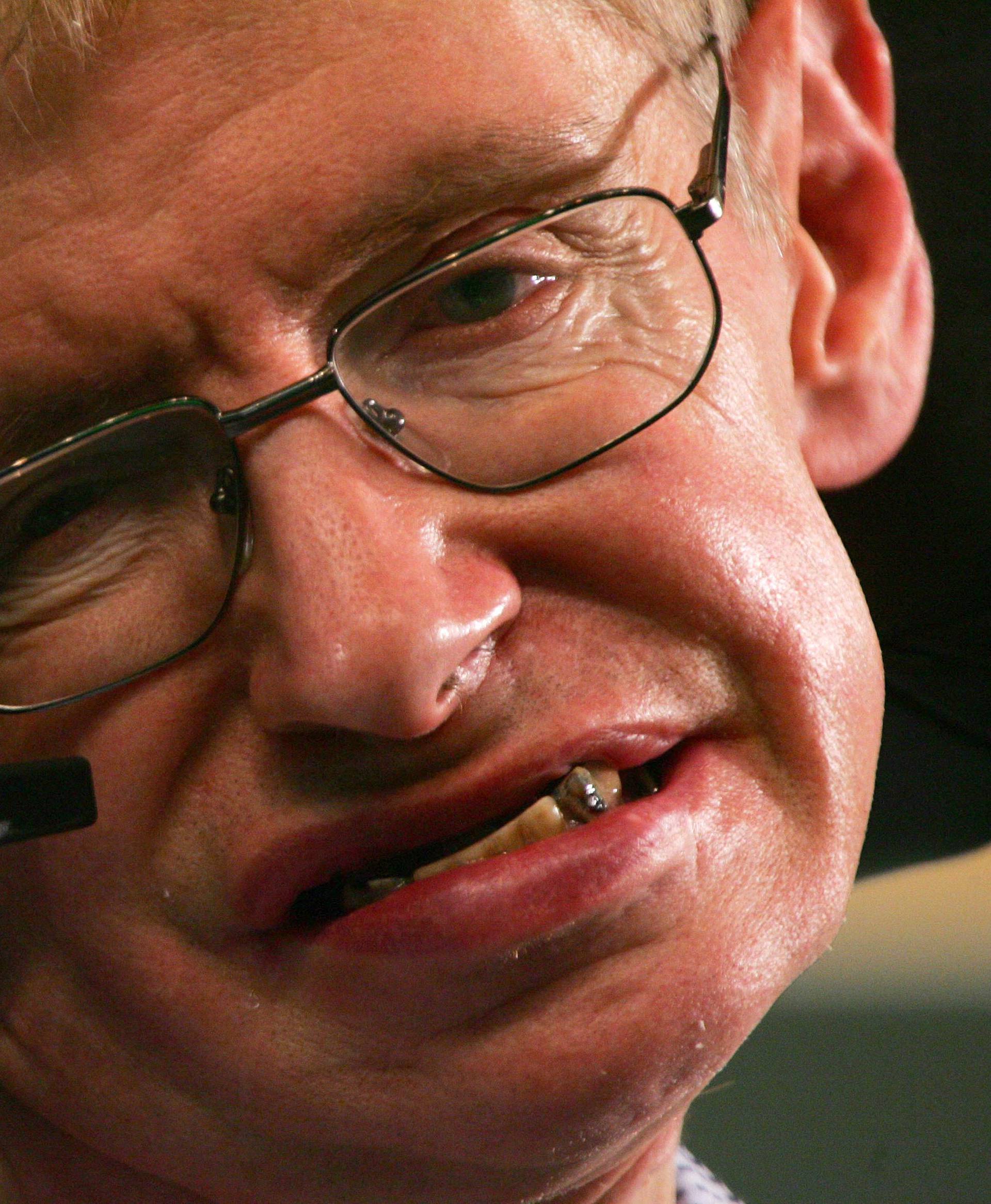 FILE PHOTO: Stephen Hawking attends a news conference at the Hong Kong University of Science and Technology