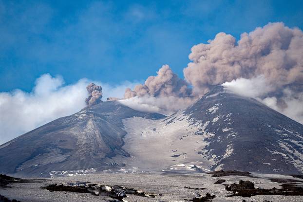 Italy's Mount Etna erupts