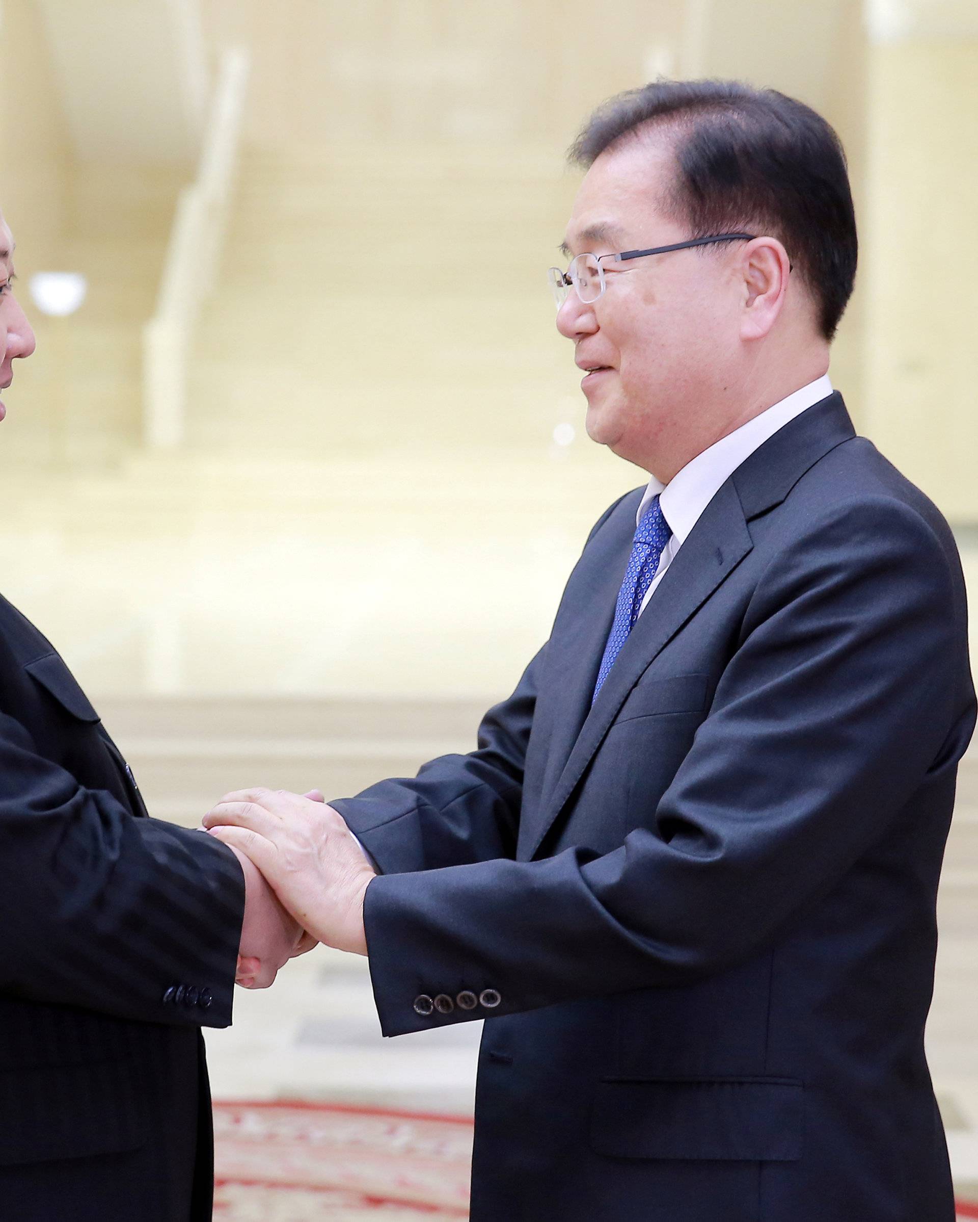 North Korean leader Kim Jong Un greets Chung Eui-yong, head of the presidential National Security Office, in Pyongyang