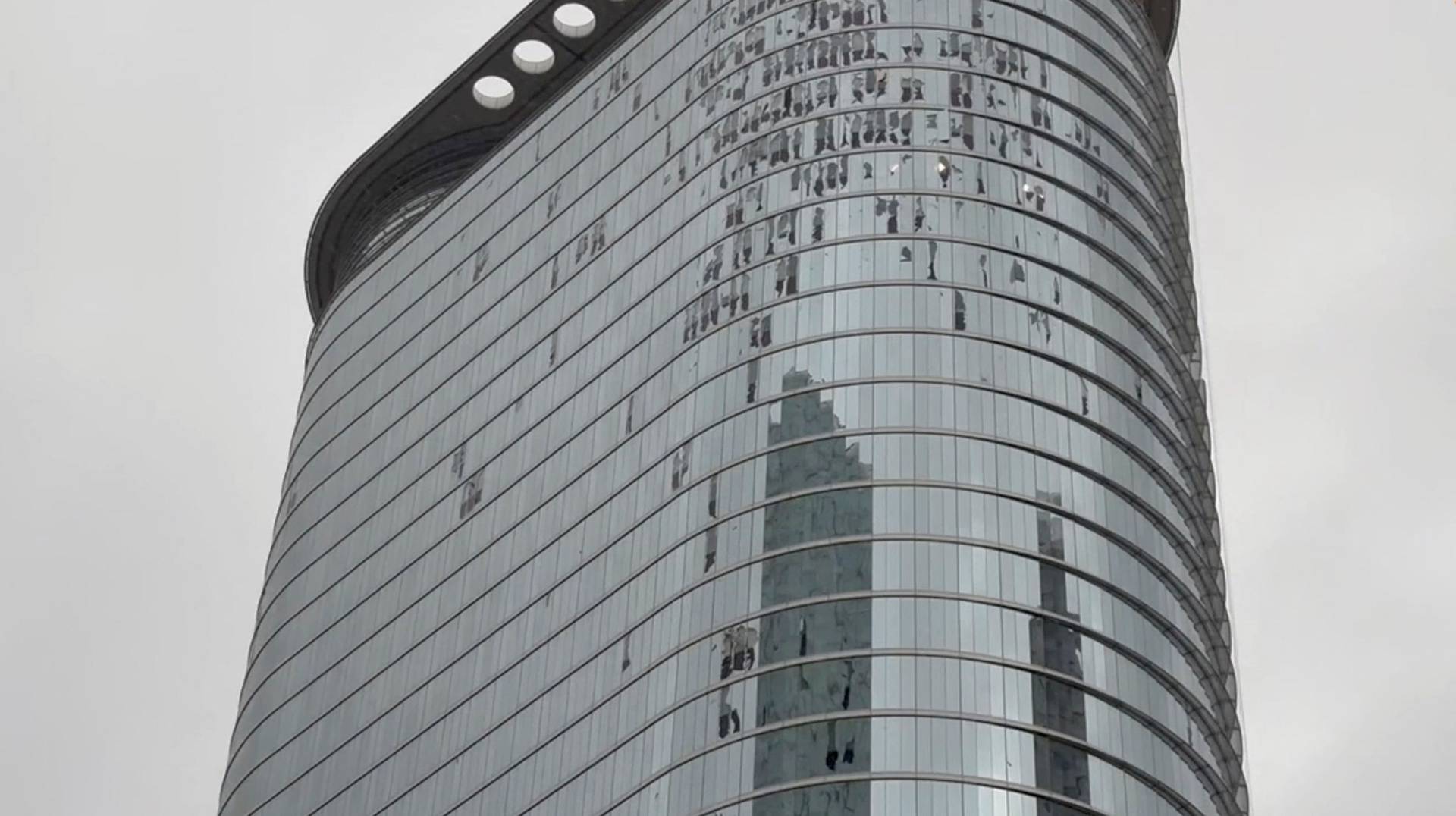 Damaged windows of a building following a storm in Houston, Texas