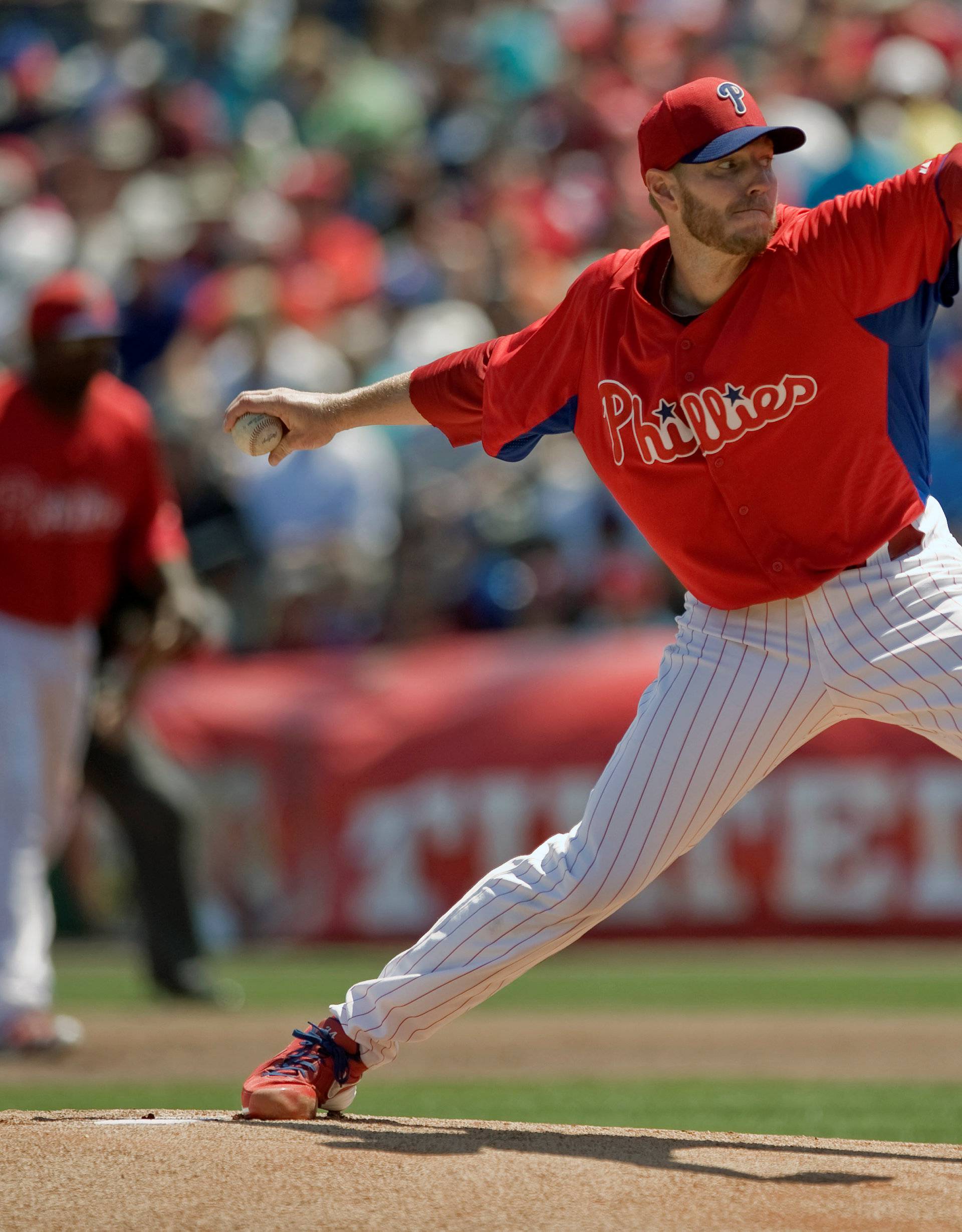 FILE PHOTO:  Philadelphia Phillies starter Halladay pitches against the Toronto Blue Jays during a MLB spring training baseball game in Clearwater, Florida
