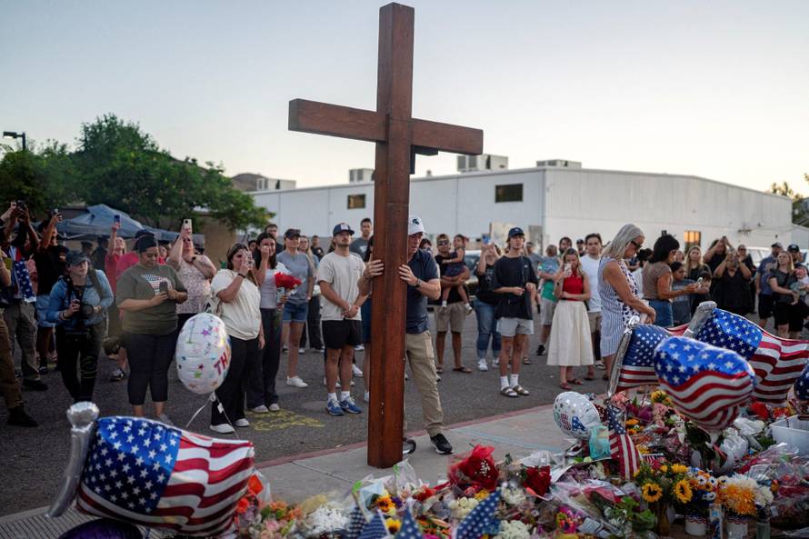 People mourn following the fatal shooting of conservative activist Charlie Kirk
