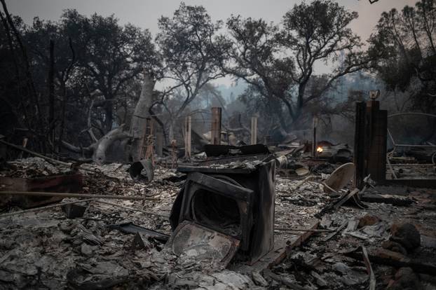 Appliances are seen destroyed in the aftermath of the Glass Fire in Deer Park, California