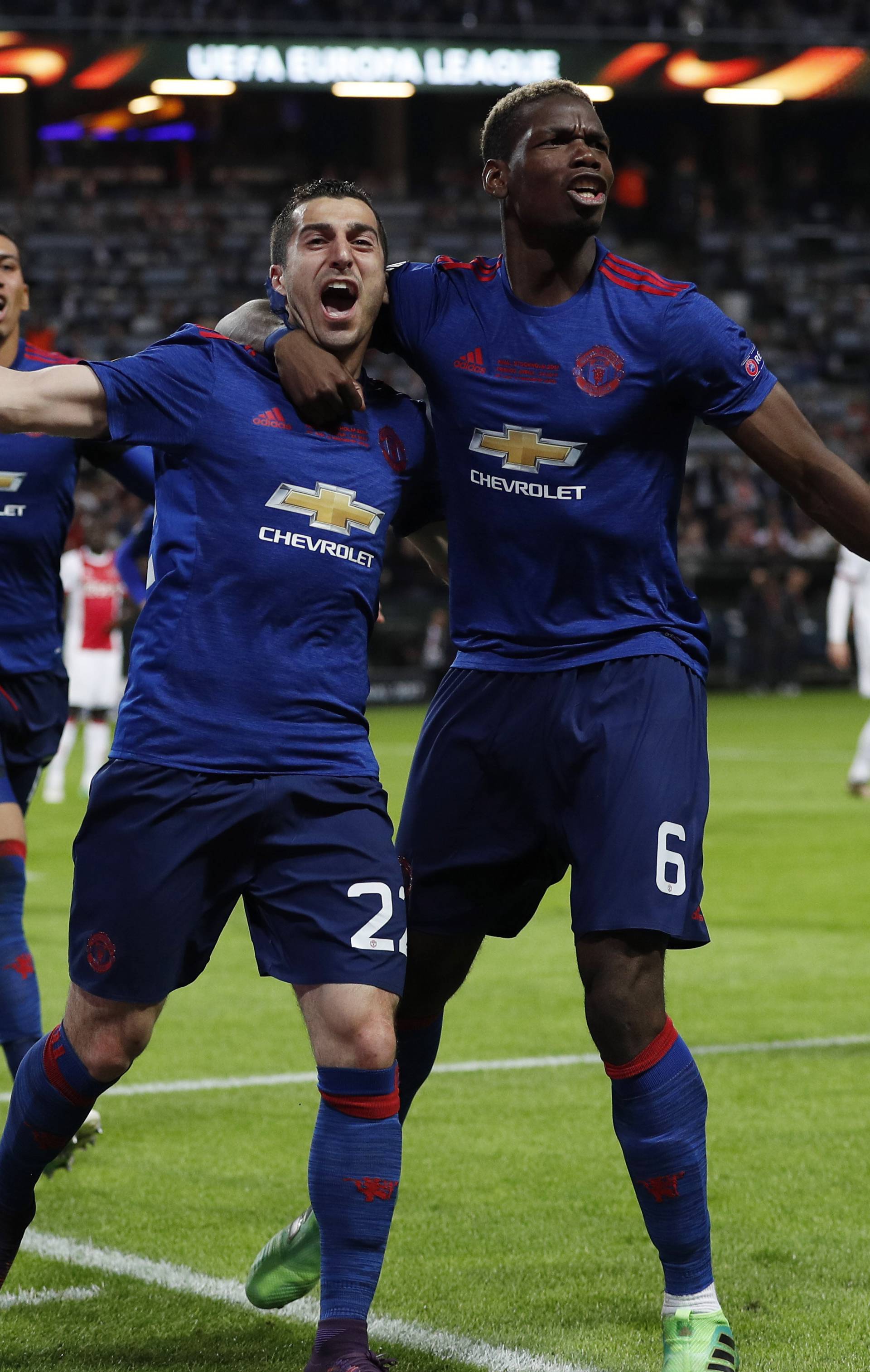 Manchester United's Henrikh Mkhitaryan celebrates scoring their second goal with Paul Pogba