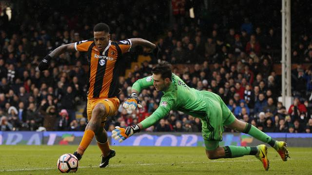 Fulham's Marcus Bettinelli fouls Hull City's Abel Hernandez and a penalty is awarded