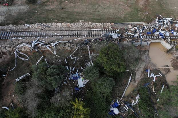 A drone view shows debris and piled up objects in a destroyed train track after deadly flooding, in Chiva