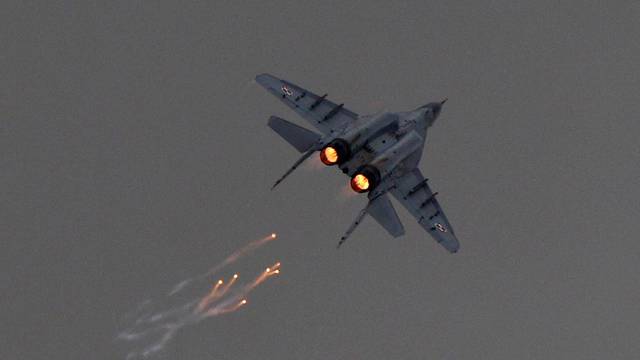 FILE PHOTO: A Polish Air Force MiG-29 aircraft fires flares during a performance at the Radom Air Show at an airport in Radom