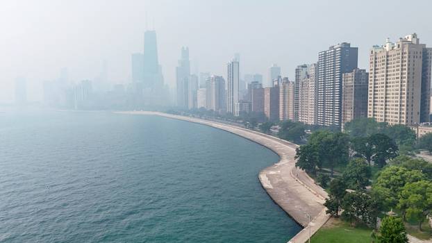 Canadian wildfire smoke shrouds the skyline in Chicago