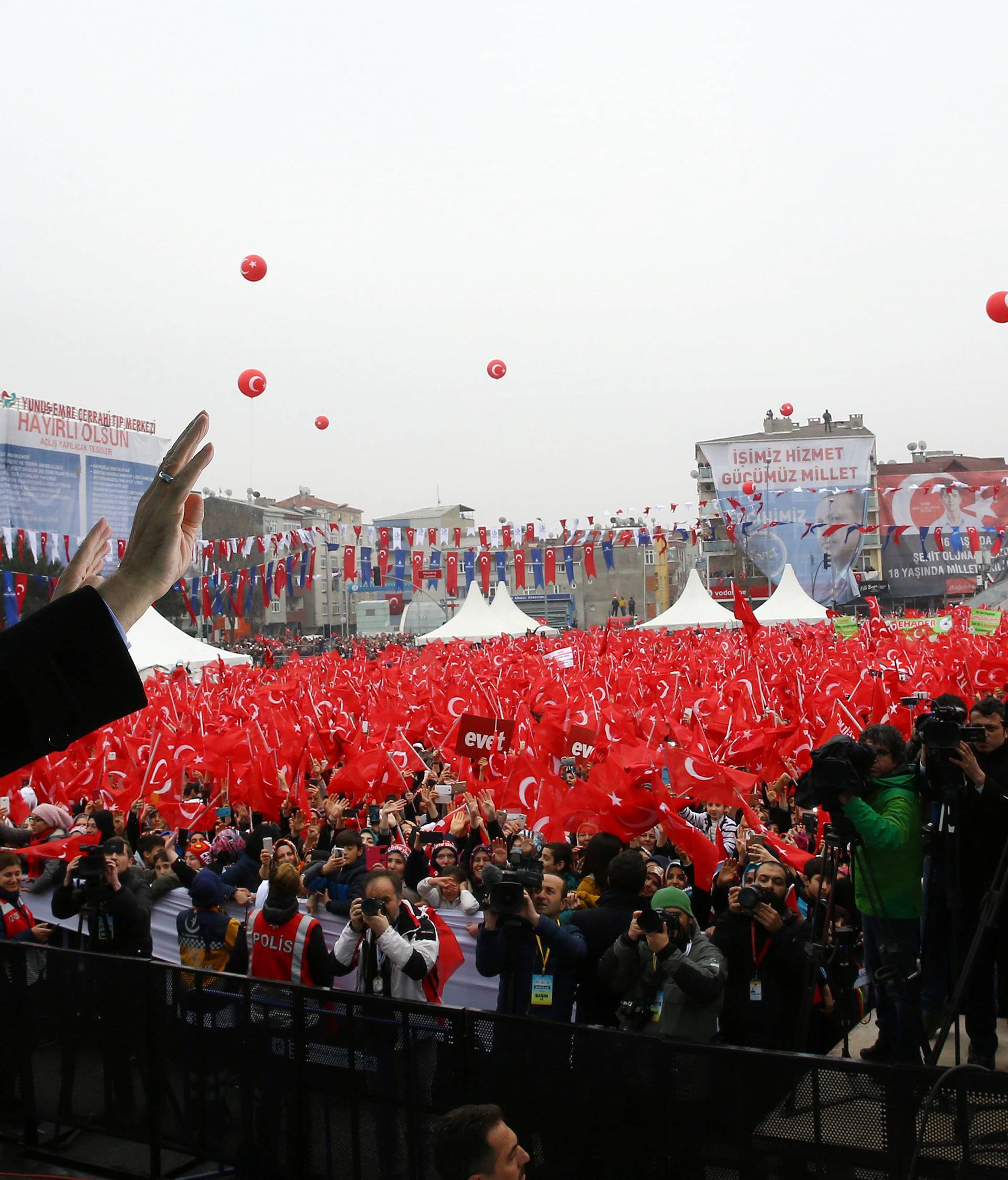 Turkish President Erdogan greets his supporters during a ceremony in Istanbul
