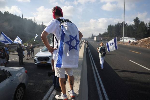 People block Israel's main highway connecting Jerusalem and Tel Aviv near Latrun