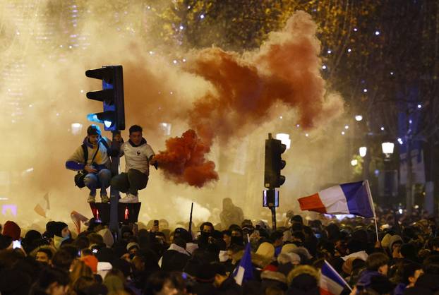 FIFA World Cup Final Qatar 2022 - France fans react on the Champs-Elysees during the final between France and Argentina