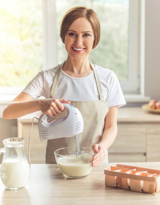 Beautiful woman baking