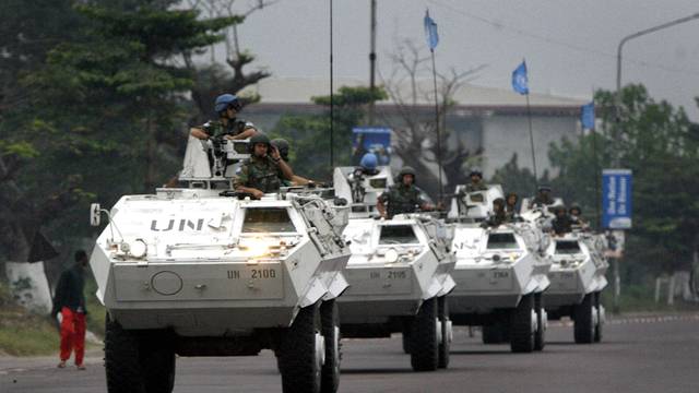 FILE PHOTO: United Nations peacekeeping troops patrol the streets on election day in Kinshasa