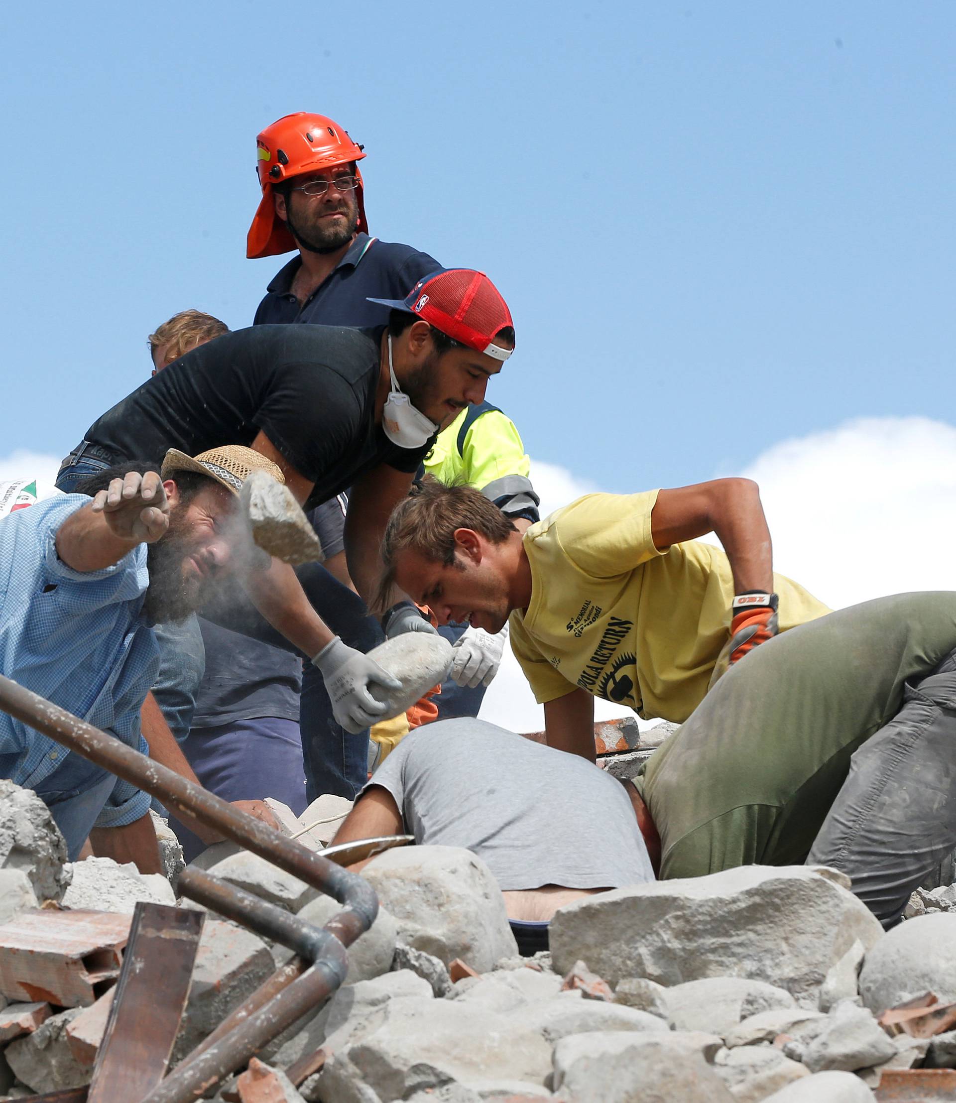 Rescuers work following an earthquake in Amatrice