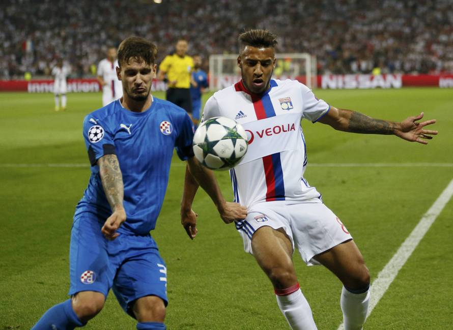 Dinamo Zagreb's Petar Stojanovic in action with Olympique Lyon's Corentin Tolisso