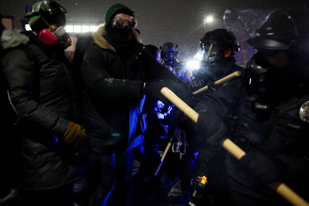 Protest outside the hotel where Bovino, who has been removed from his role, is reportedly staying, in Maple Grove