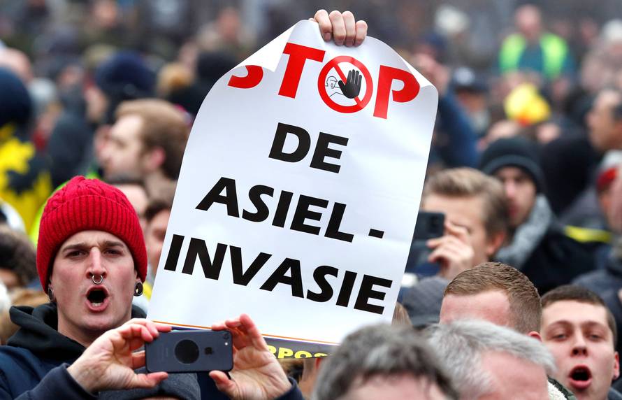 Flemish nationalists attend a protest against Marrakesh Migration Pact in Brussels