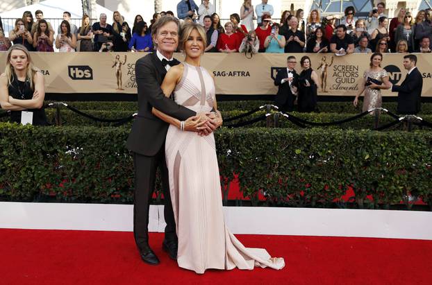 William H. Macy and Felicity Huffman arrive at the 23rd Screen Actors Guild Awards in Los Angeles