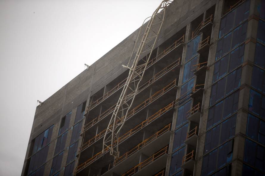 A collapsed construction crane is seen in Downtown Miami as Hurricane Irma arrives at south Florida