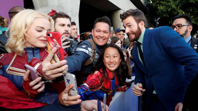 Cast member Chris Evans poses with fans on the red carpet at the world premiere of the film "The Avengers: Endgame" in Los Angeles