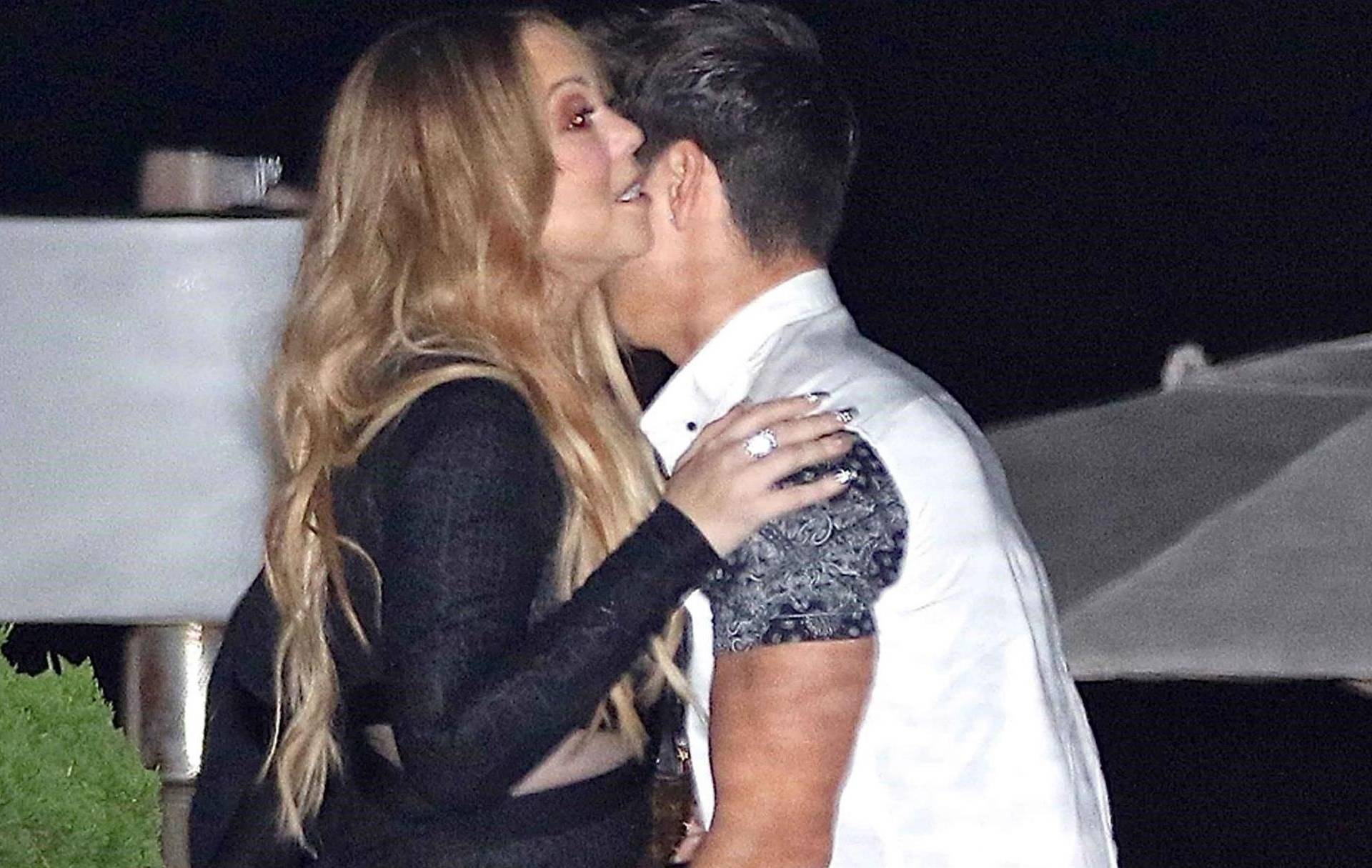 Mariah Carey and Bryan Tanaka pull up to Nobu in a silver Ferrari