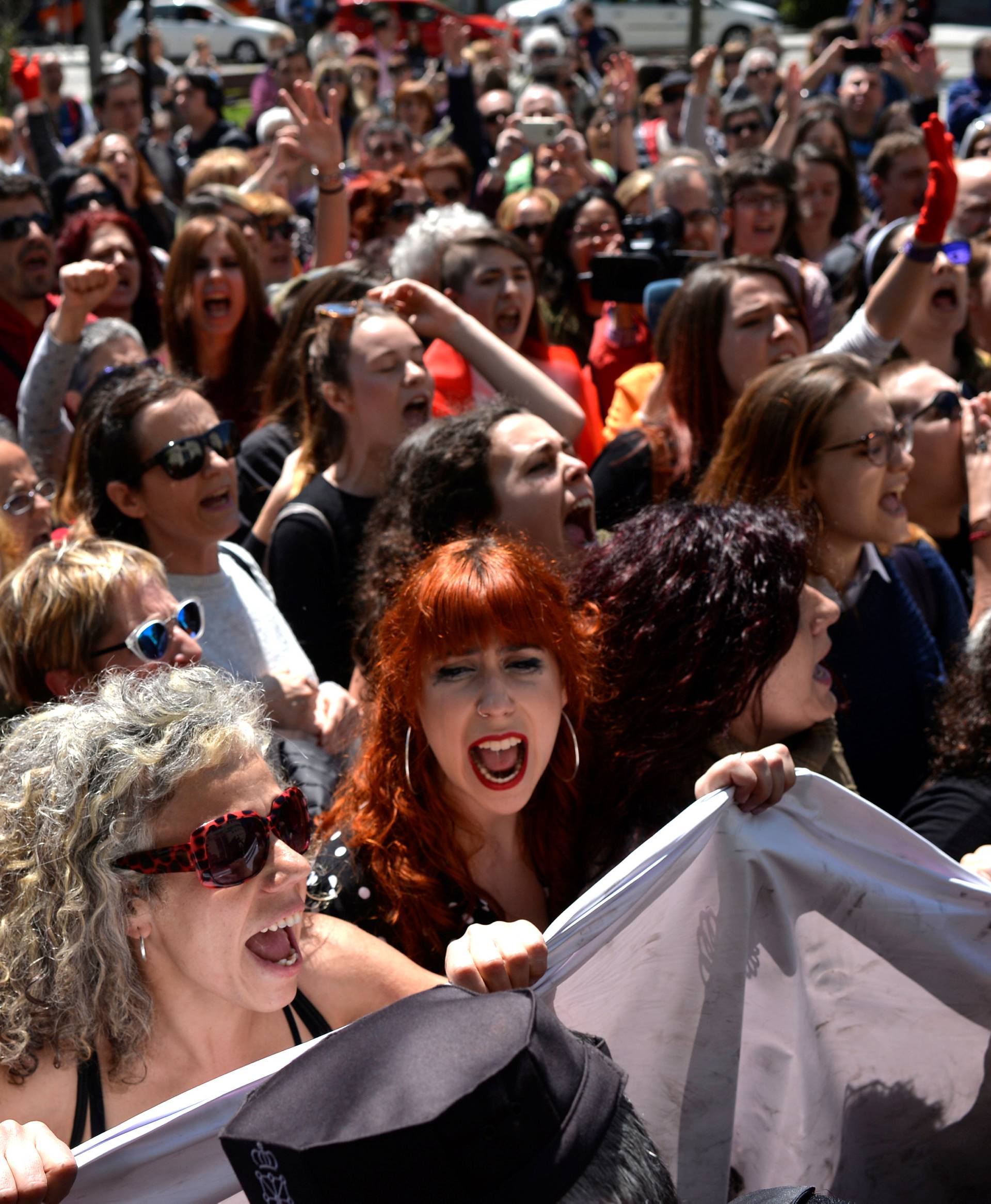 Protesters chant "It's not abuse, it's rape!" after a nine-year prison sentence was given to five men accused of the multiple rape of a woman during Pamplona's San Fermin festival in 2016, in Pamplona