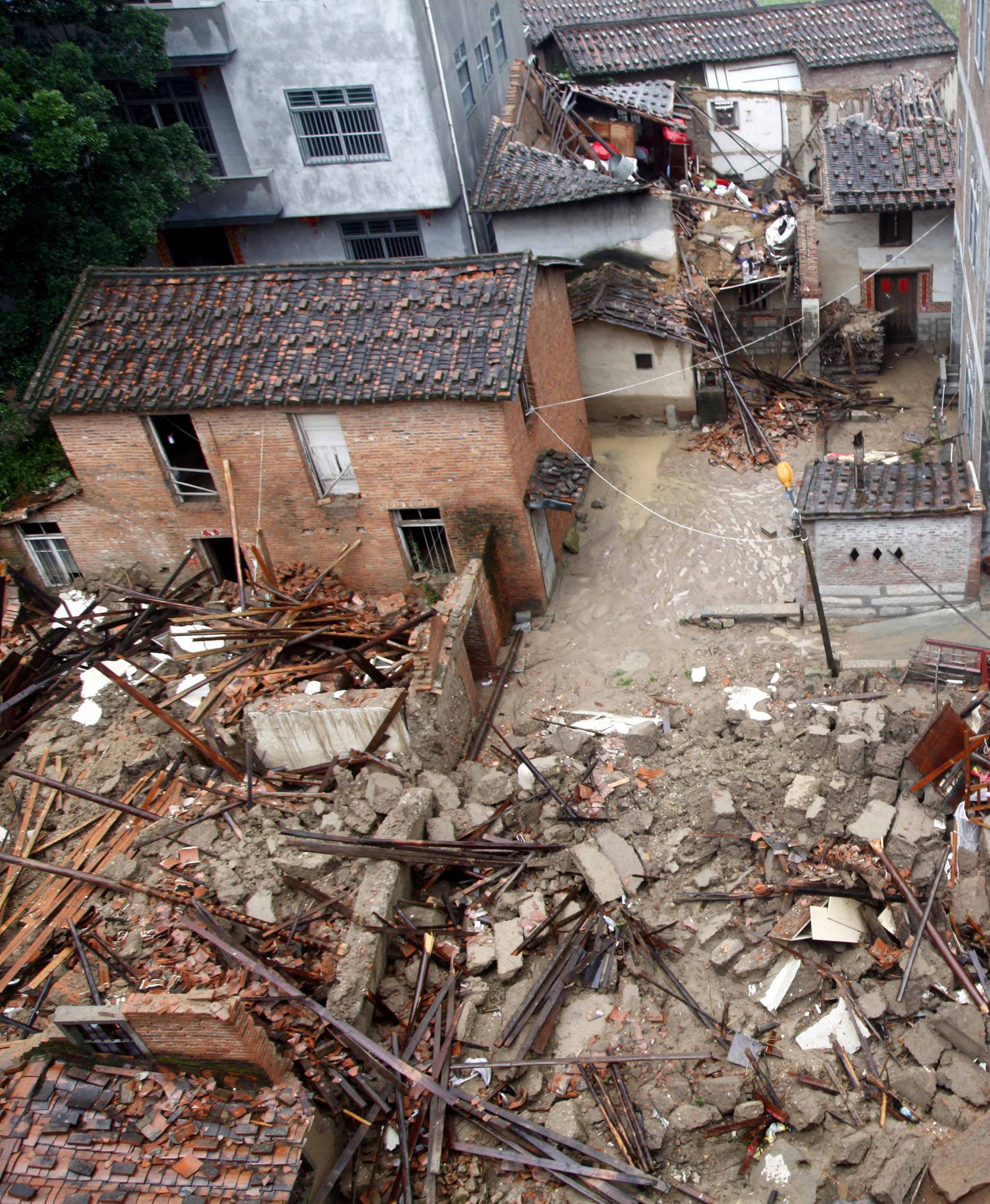 Damaged and collapsed buildings are seen as Typhoon Nepartak brings heavy rainfall in Putian, Fujian Province
