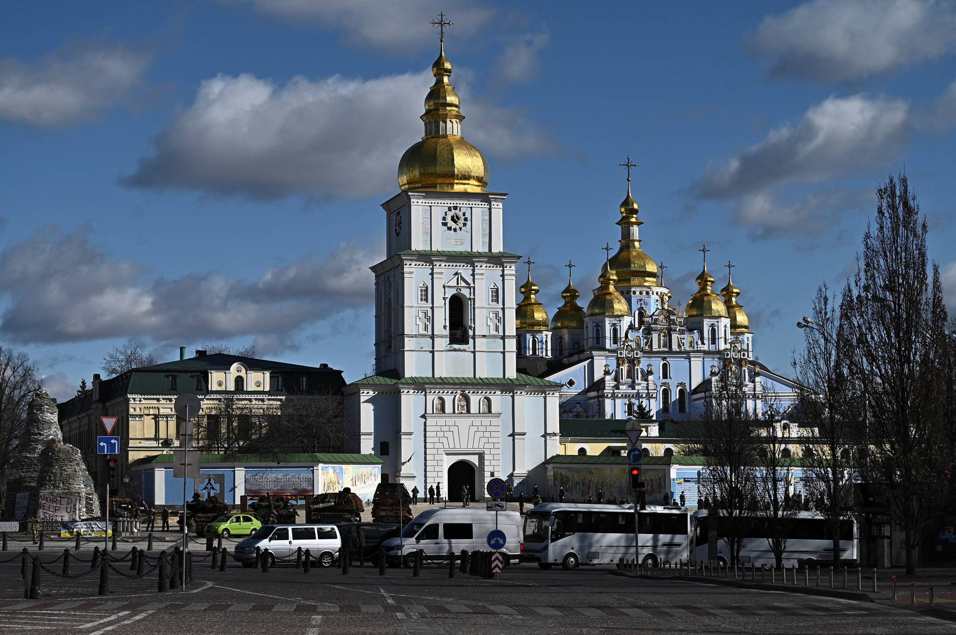 Members of the Honour Guard stand next to the Saint Michael's cathedral in Kyiv