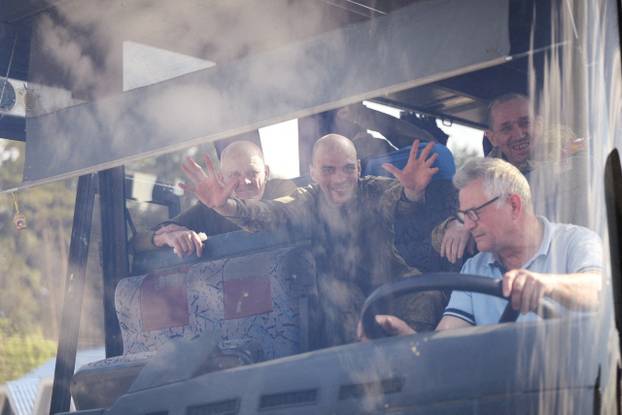 Ukrainian POWs are seen after a swap at an unknown location in Ukraine