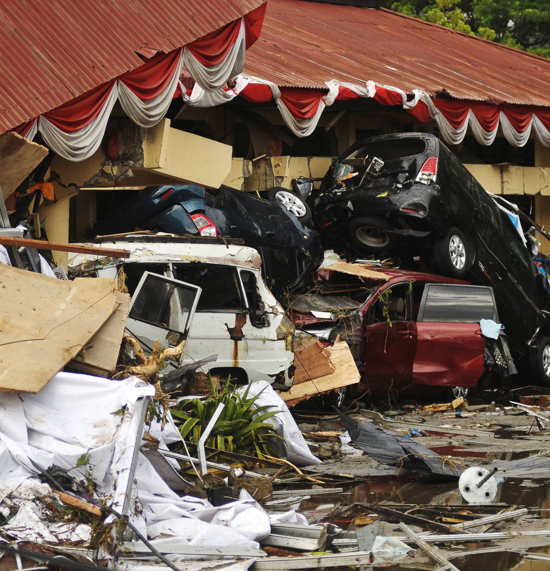 Damage from an earthquake and tsunami can be seen in Palu, Central Sulawesi