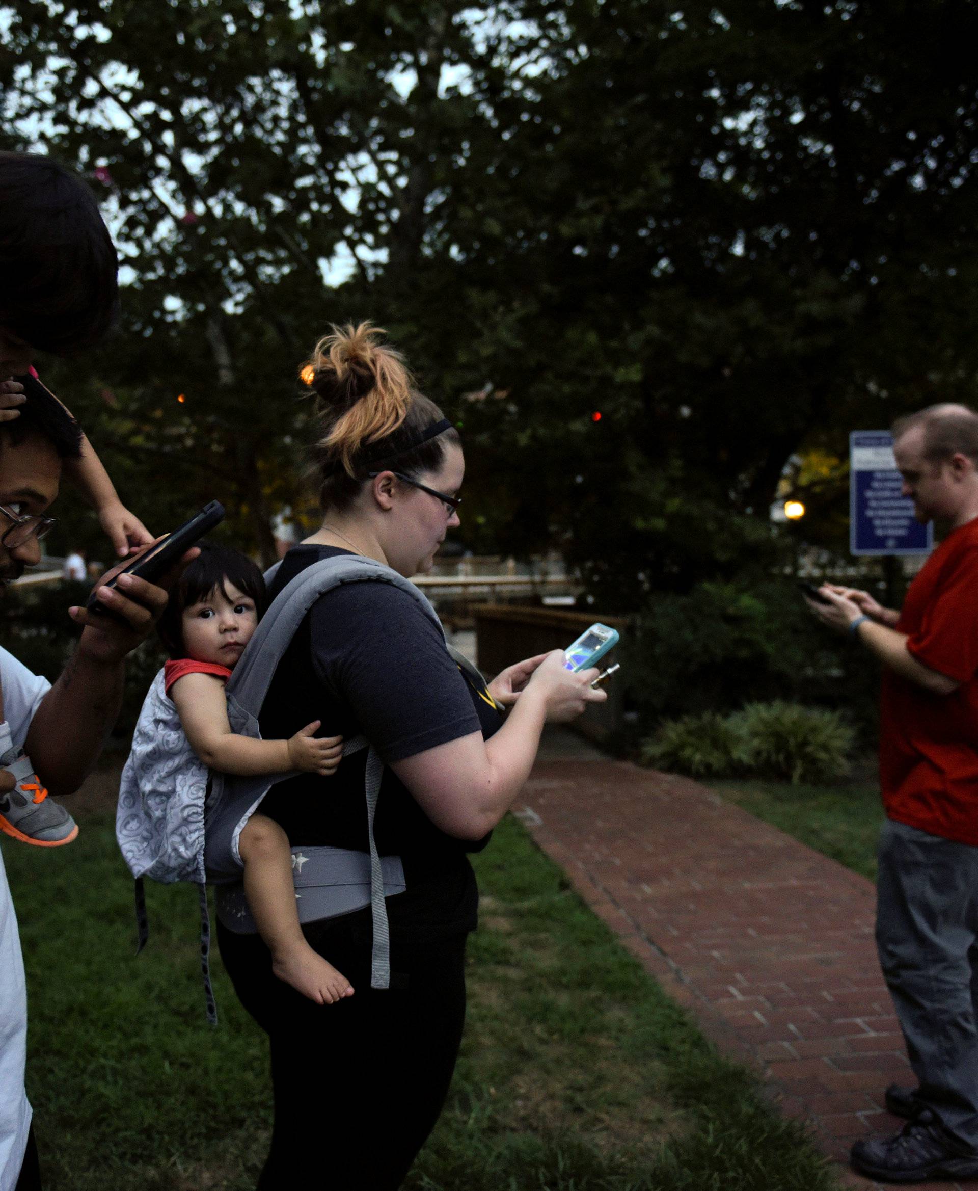 People play "Pokemon GO" in the small town of Occoquan