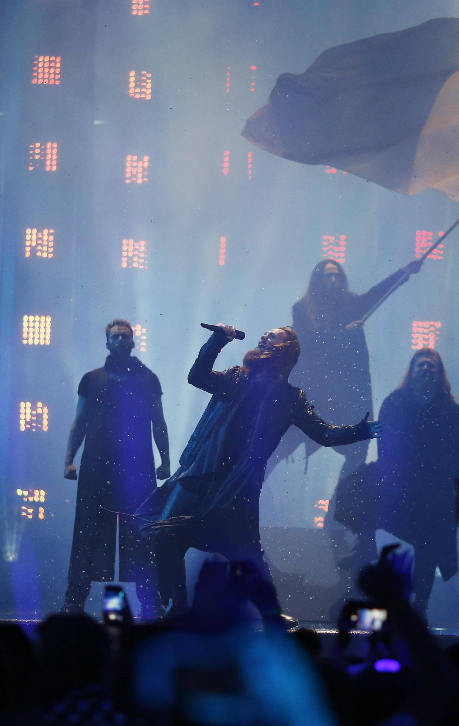 Denmarkâs Rasmussen performs âHigher Groundâ during the Semi-Final 2 for Eurovision Song Contest 2018 in Lisbon