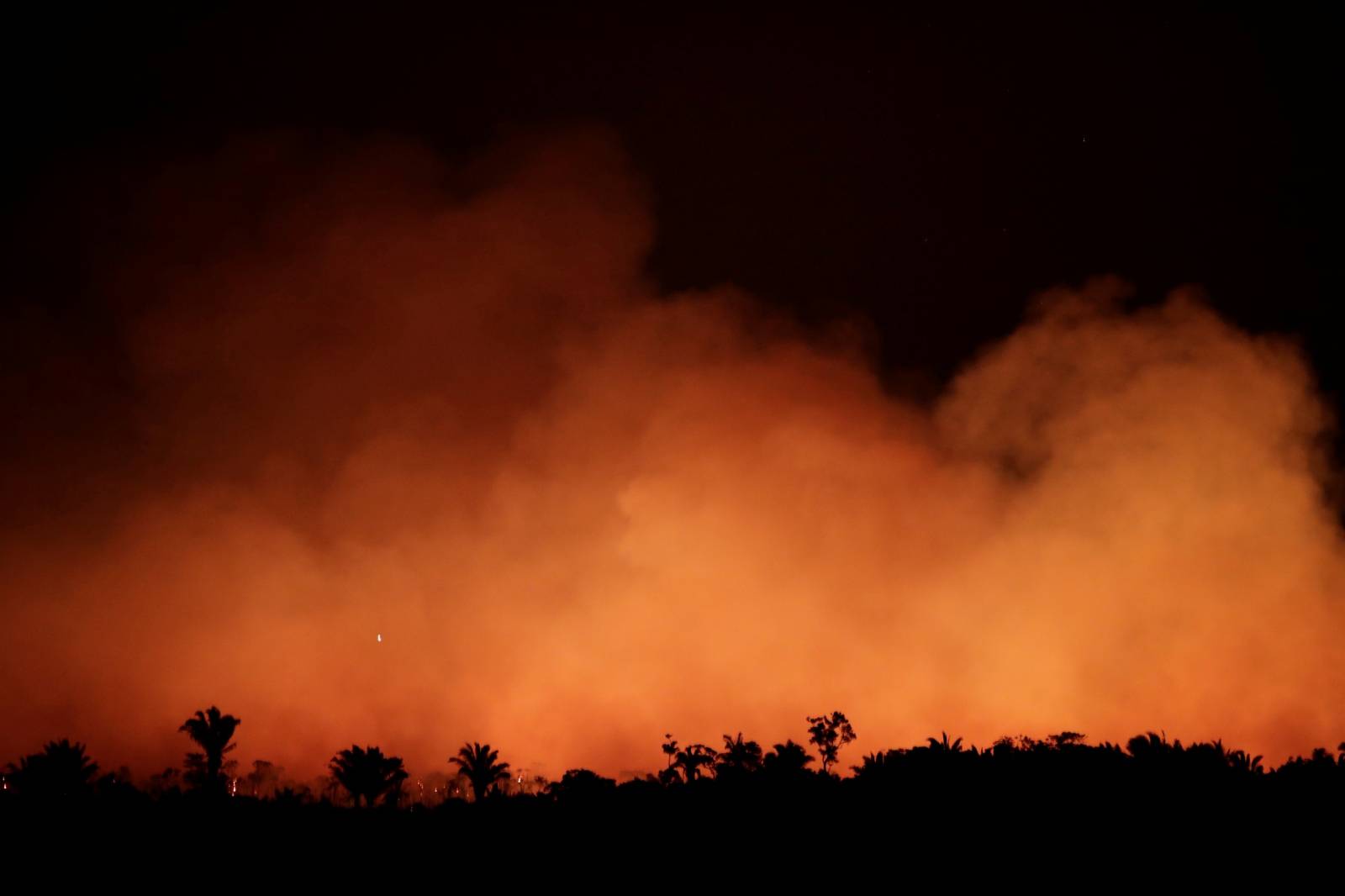 Smoke billows during a fire in an area of the Amazon rainforest near Humaita, Amazonas
