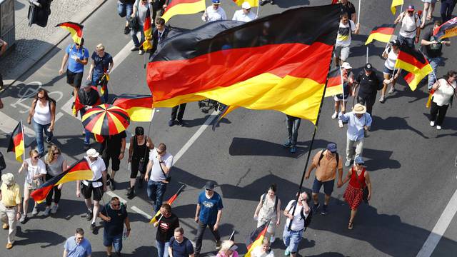 Supporters of the Anti-immigration party Alternative for Germany (AfD) hold a protest in Berlin