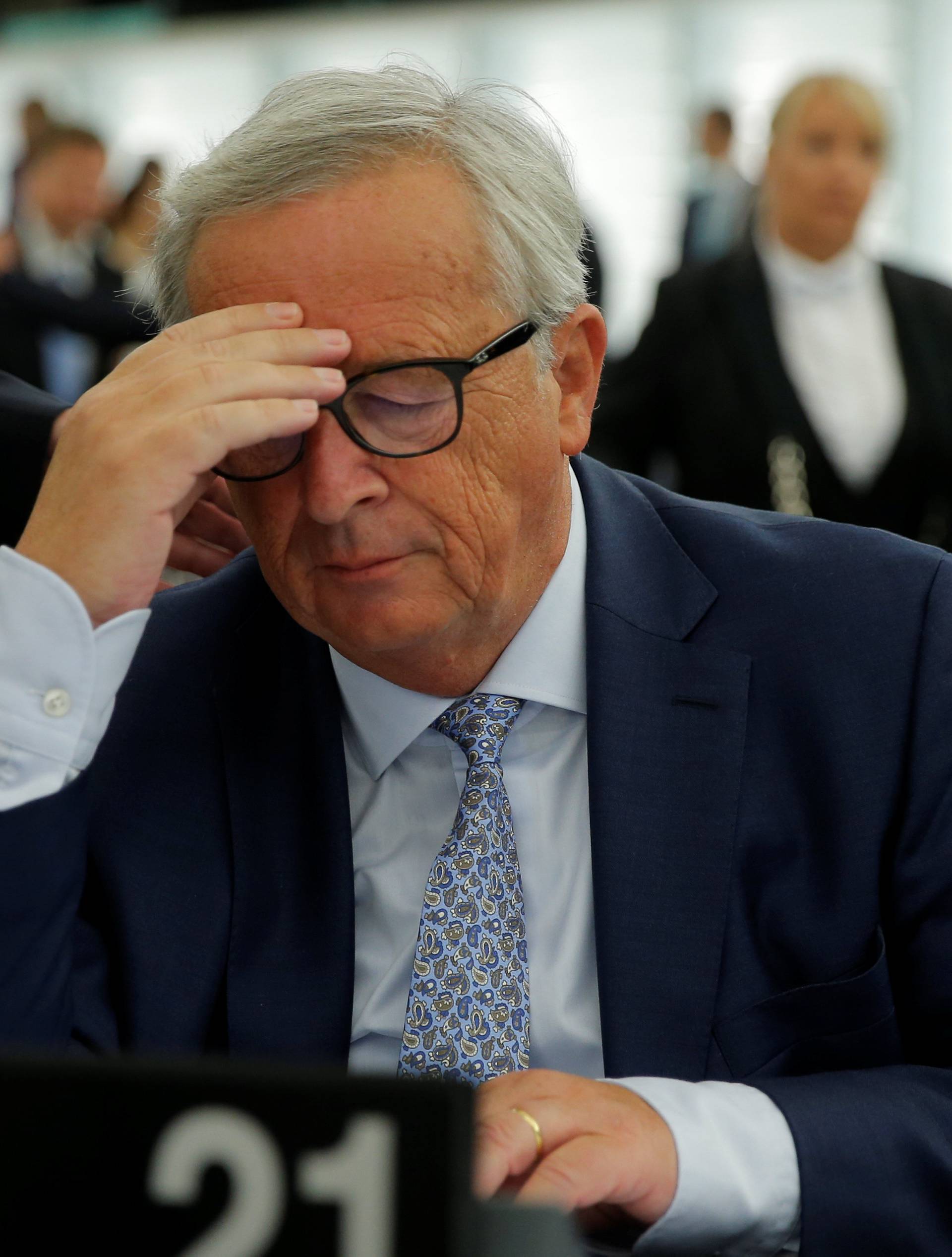 European Commission President Juncker reacts before a debate on The State of the European Union at the European Parliament in Strasbourg