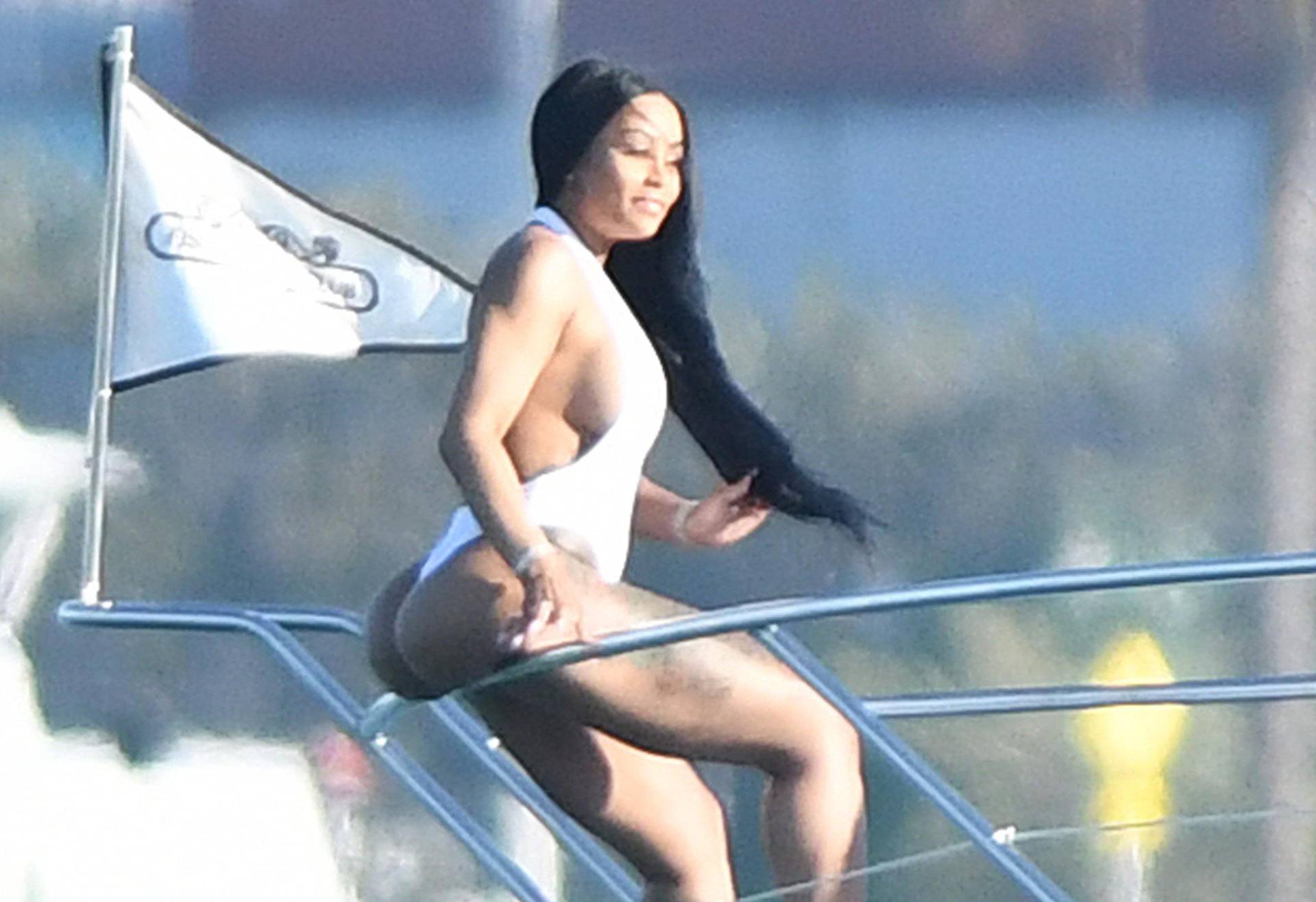 Blac Chyna on a Yacht in a Revealing White One-Piece