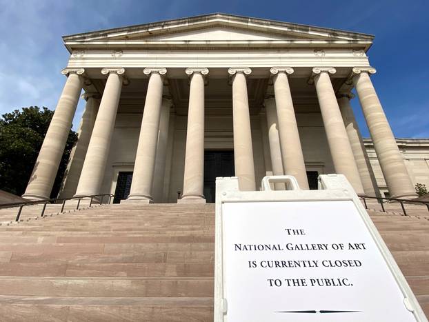A sign indicates that the National Gallery of Art has been closed to the public due to the coronavirus threat in Washington